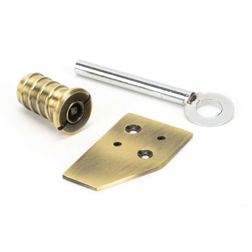 From the Anvil Key-Flush Sash Stop - Aged Brass